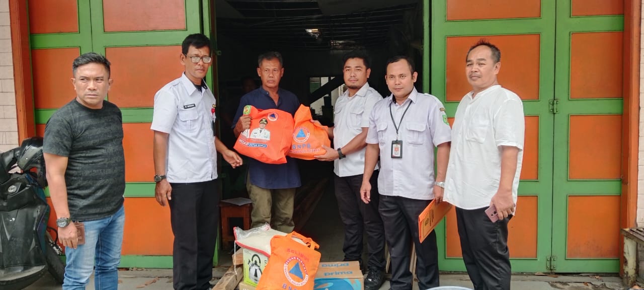 Penyerahan bantuan kepada korban musibah kebakaran